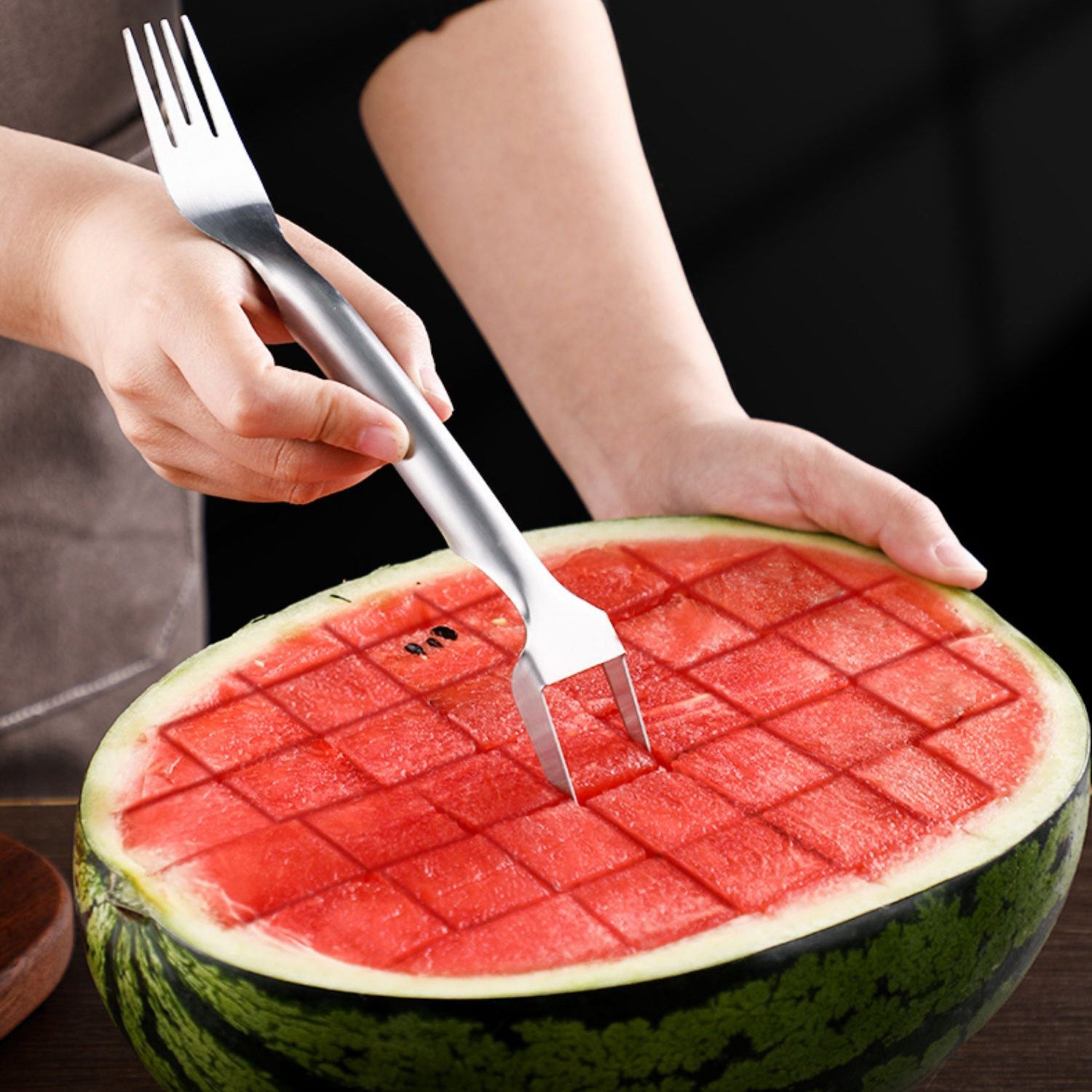 2 in 1 Watermelon Fork Slicer made from stainless steel for cutting and serving watermelon, mango, and other fruits with ease