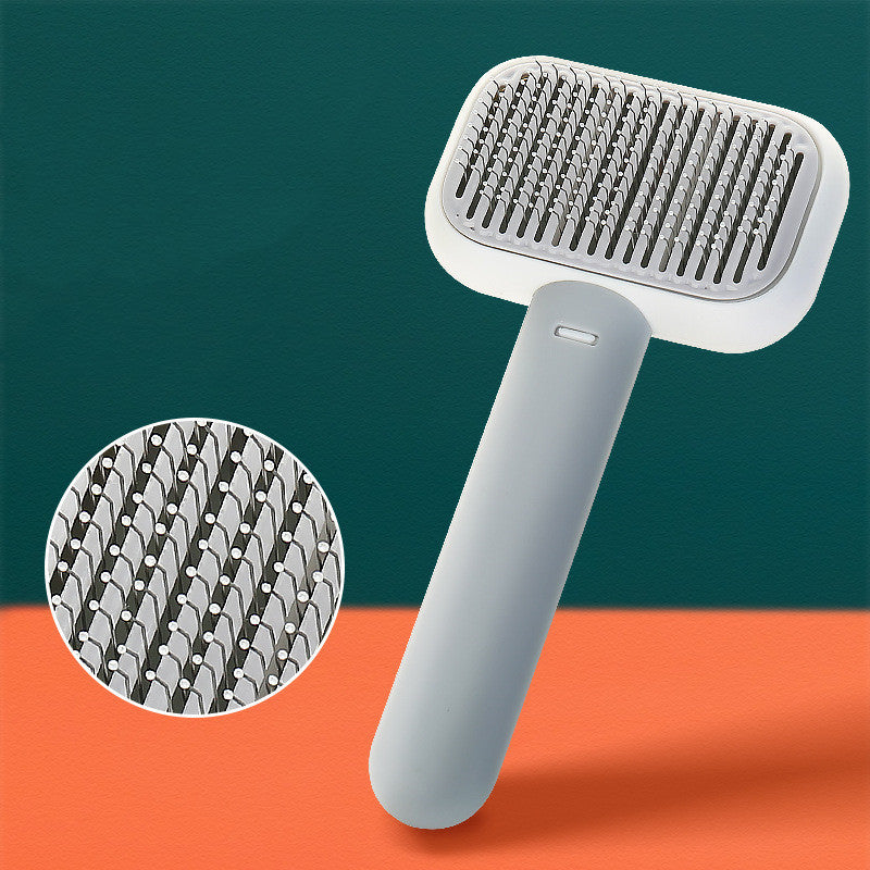 Pet Grooming Massage Brush with stainless steel pins for removing loose hair, tangles, and knots from cats and dogs while providing a gentle massage