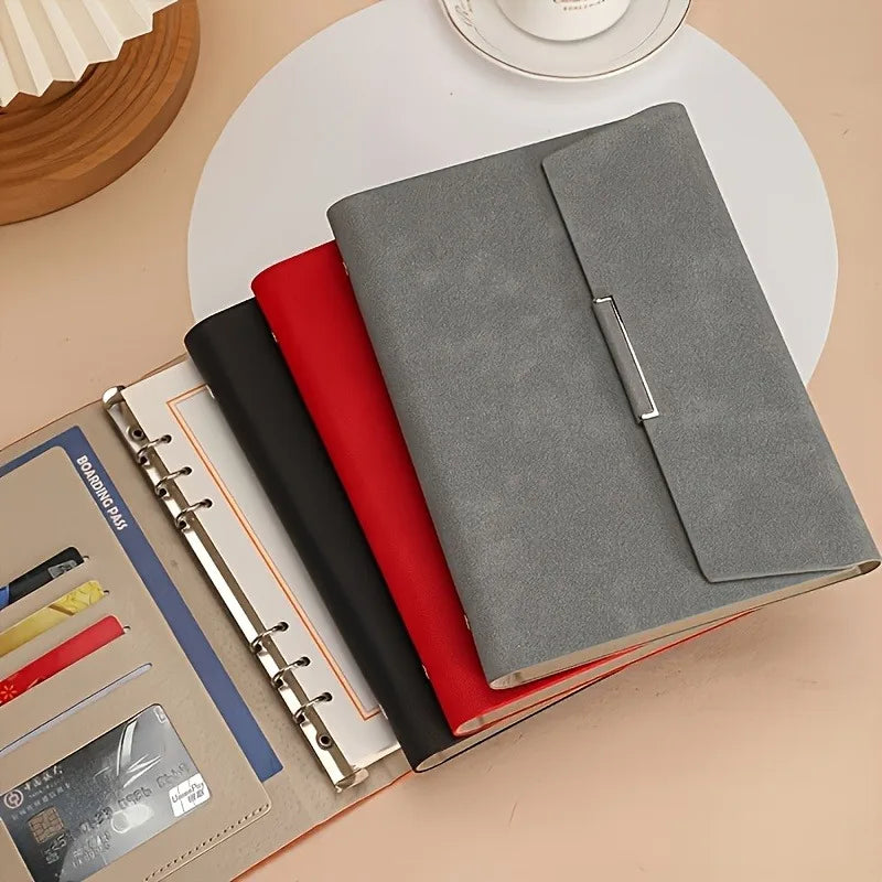 1 high-quality PU cover three fold binder, containing 100 sheets of A5 size paper and high-quality six hole metal rings