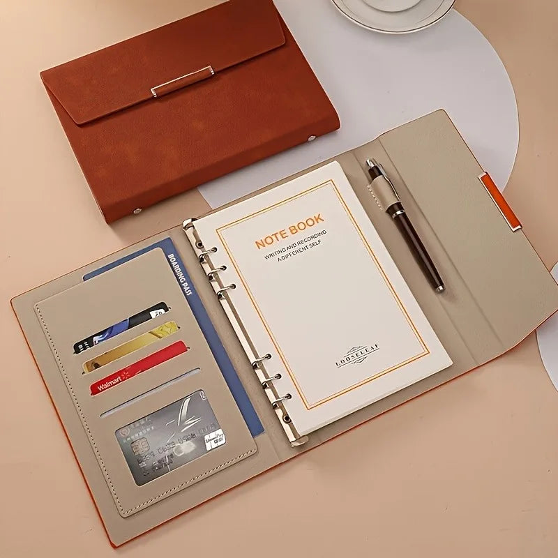 1 high-quality PU cover three fold binder, containing 100 sheets of A5 size paper and high-quality six hole metal rings