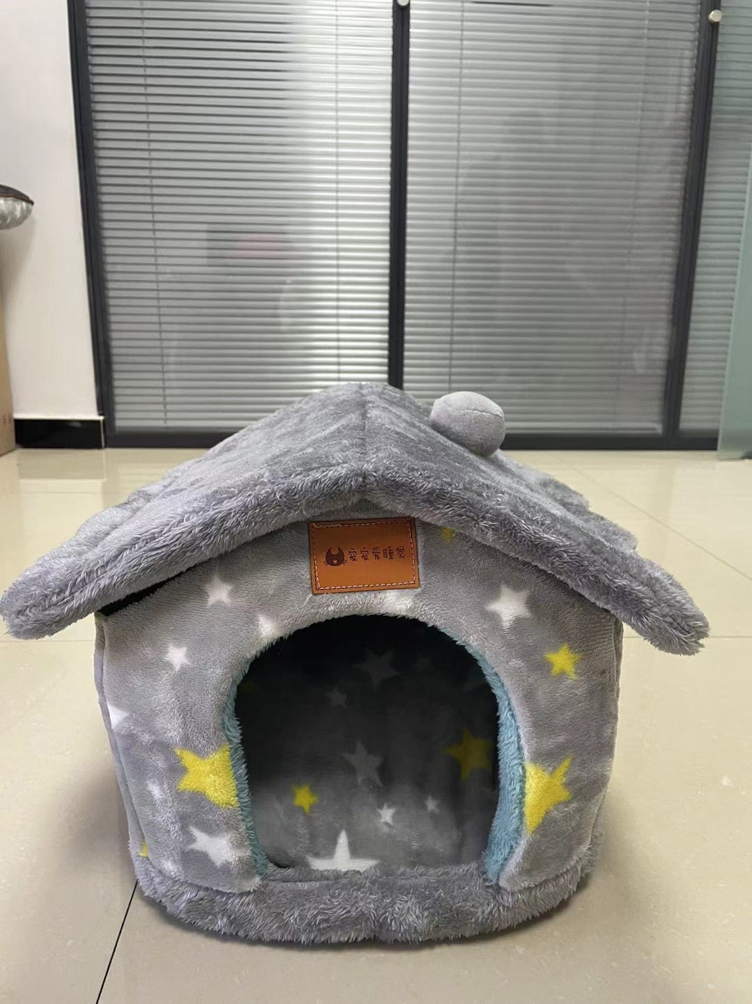 Foldable Warm Pet House with soft plush interior, removable cushion, semi-enclosed cave design, and non-slip base for cats and small dogs