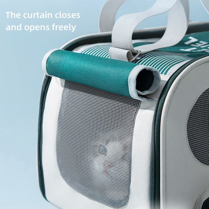 Soft Sided Pet Travel Carrier with breathable mesh panels, foldable design, shoulder strap, and secure zipper for cats and small dogs