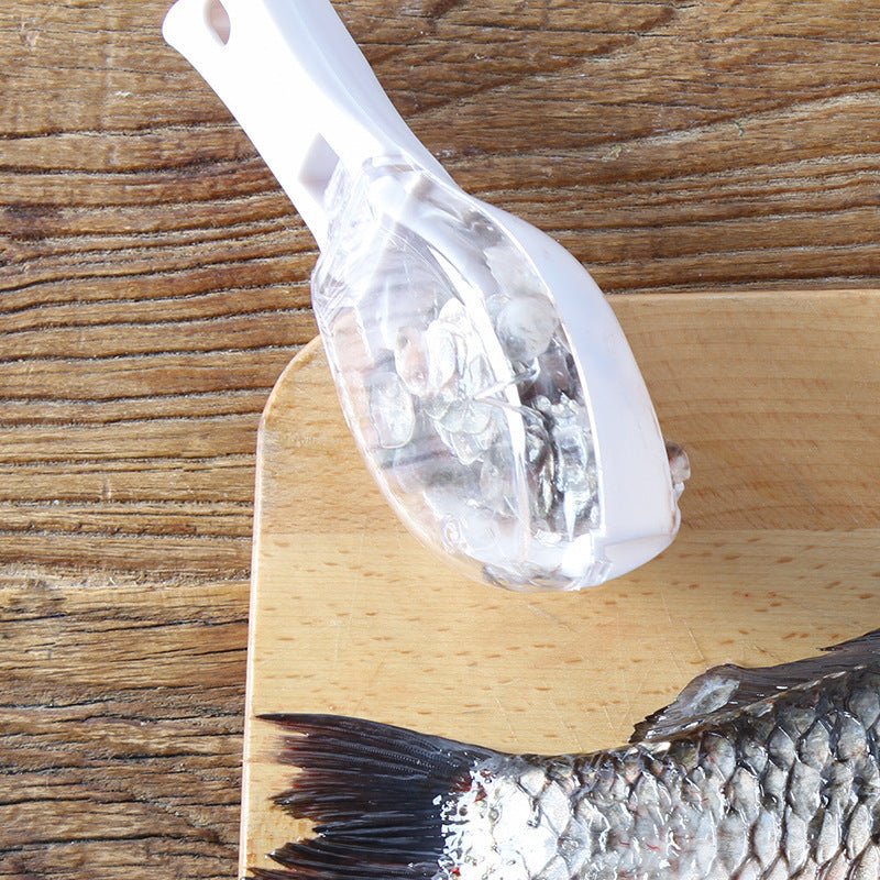 Fish Scale Scraper with protective cover, ergonomic handle, and stainless steel scraping edge for easy fish cleaning in the kitchen