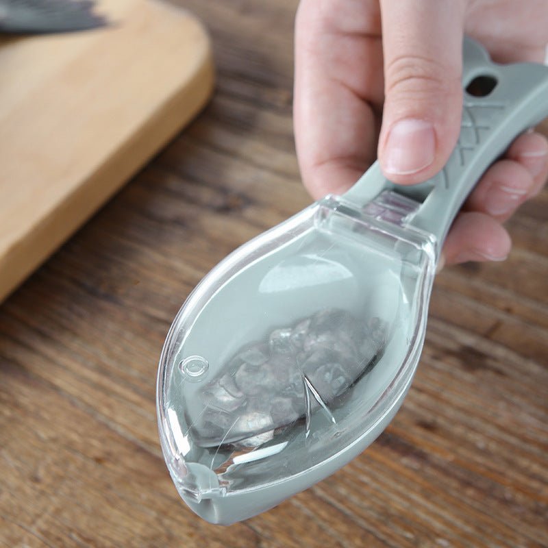 Fish Scale Scraper with protective cover, ergonomic handle, and stainless steel scraping edge for easy fish cleaning in the kitchen